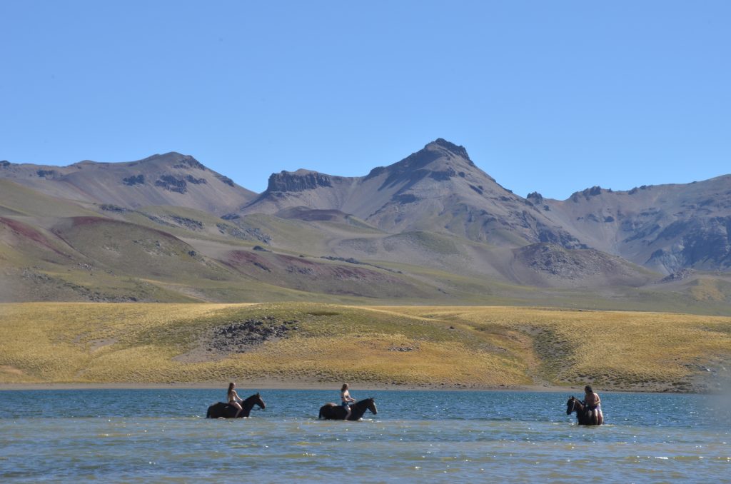 3 girls bathing in late during Horse Riding in Chile
